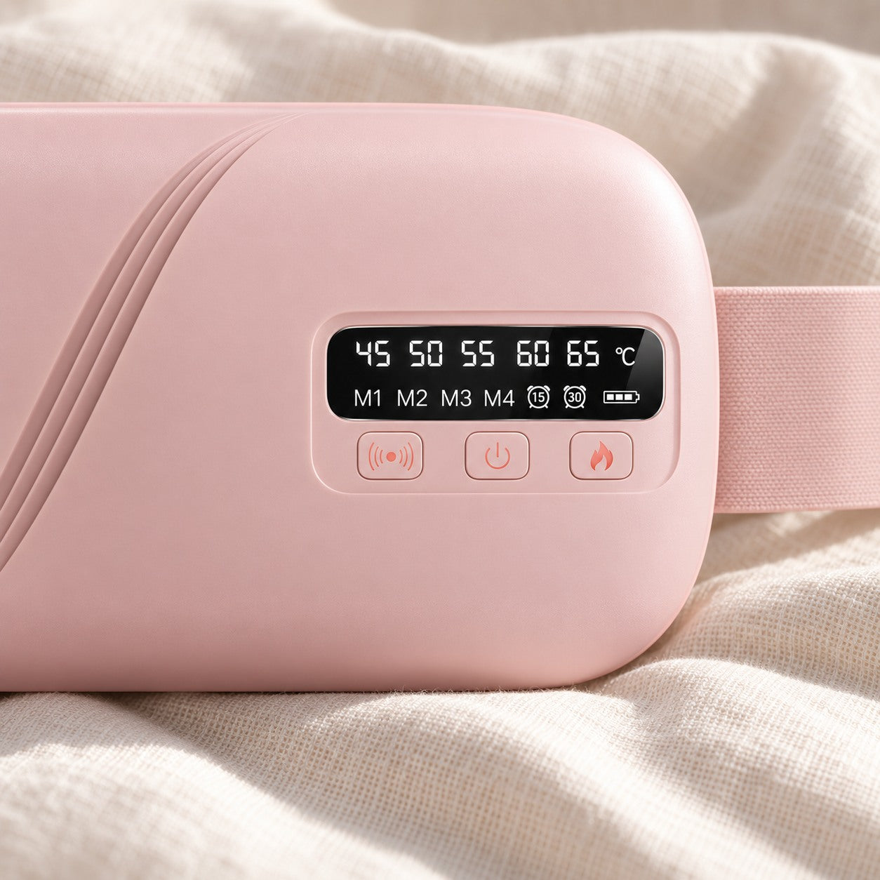Mooni massage button on the left, power in the centre and heat on the right
